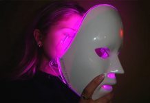 Woman wearing an LED light face mask