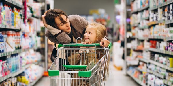 Mother with daughter at a grocery store
